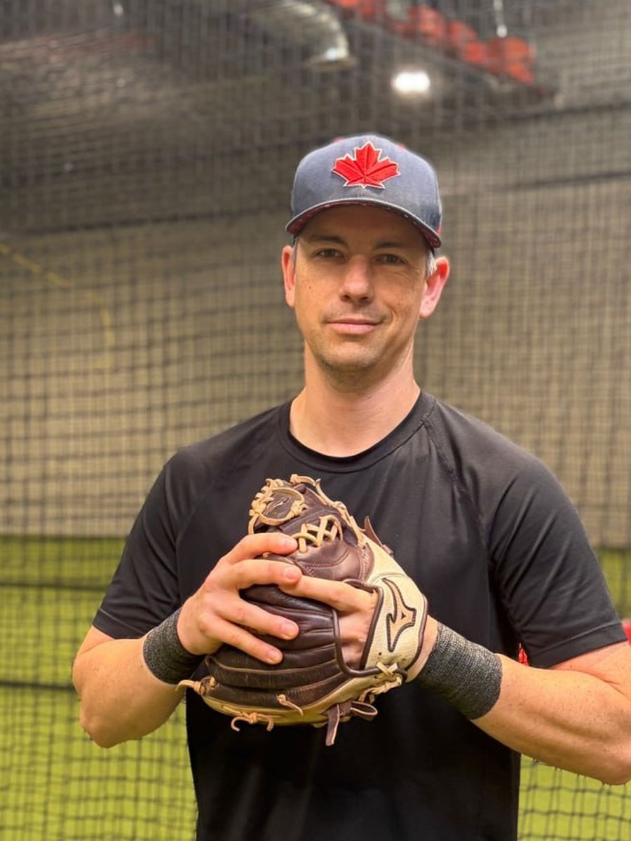 Coach Chris Hastings in his black TI Baseball shirt